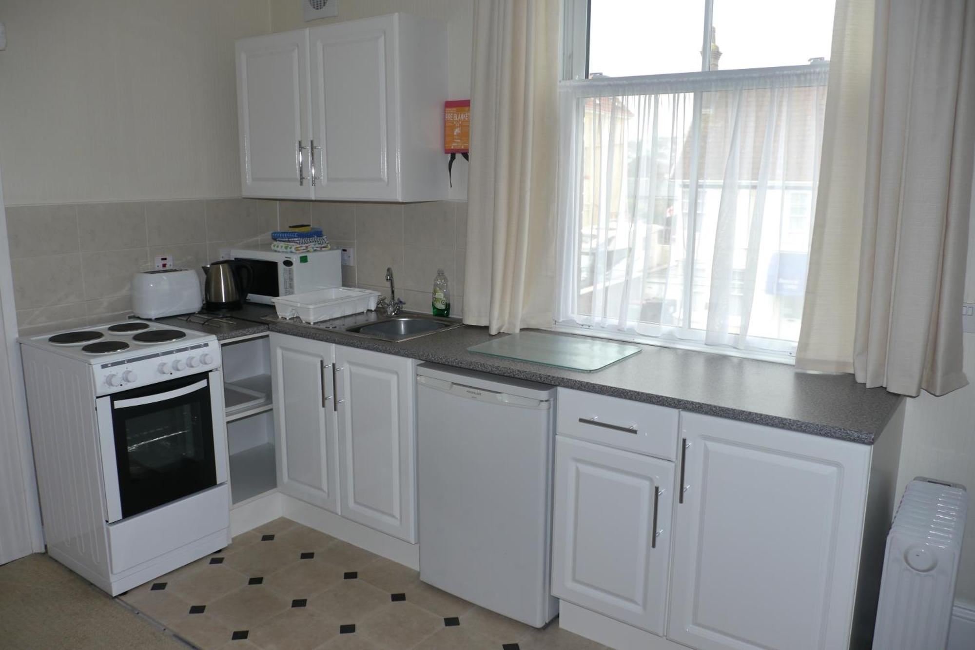 Broadshade Holiday Apartments Пейнтън Стая снимка